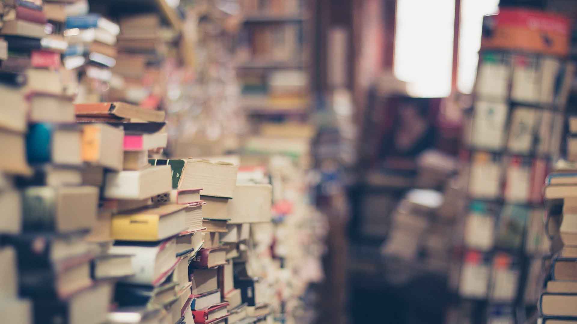Books stacked in a bookshop